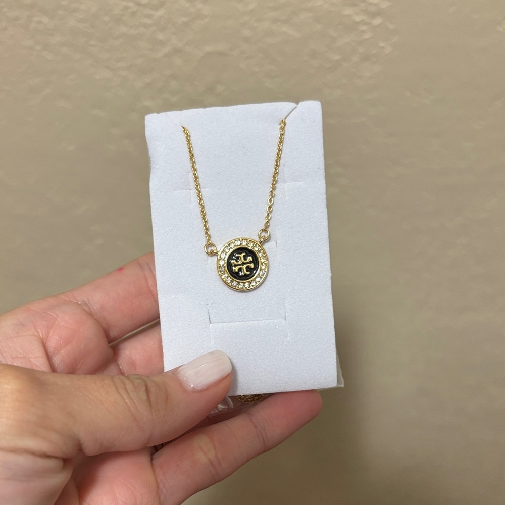 Elegant Gold and Black Tory Burch Pendant Necklace